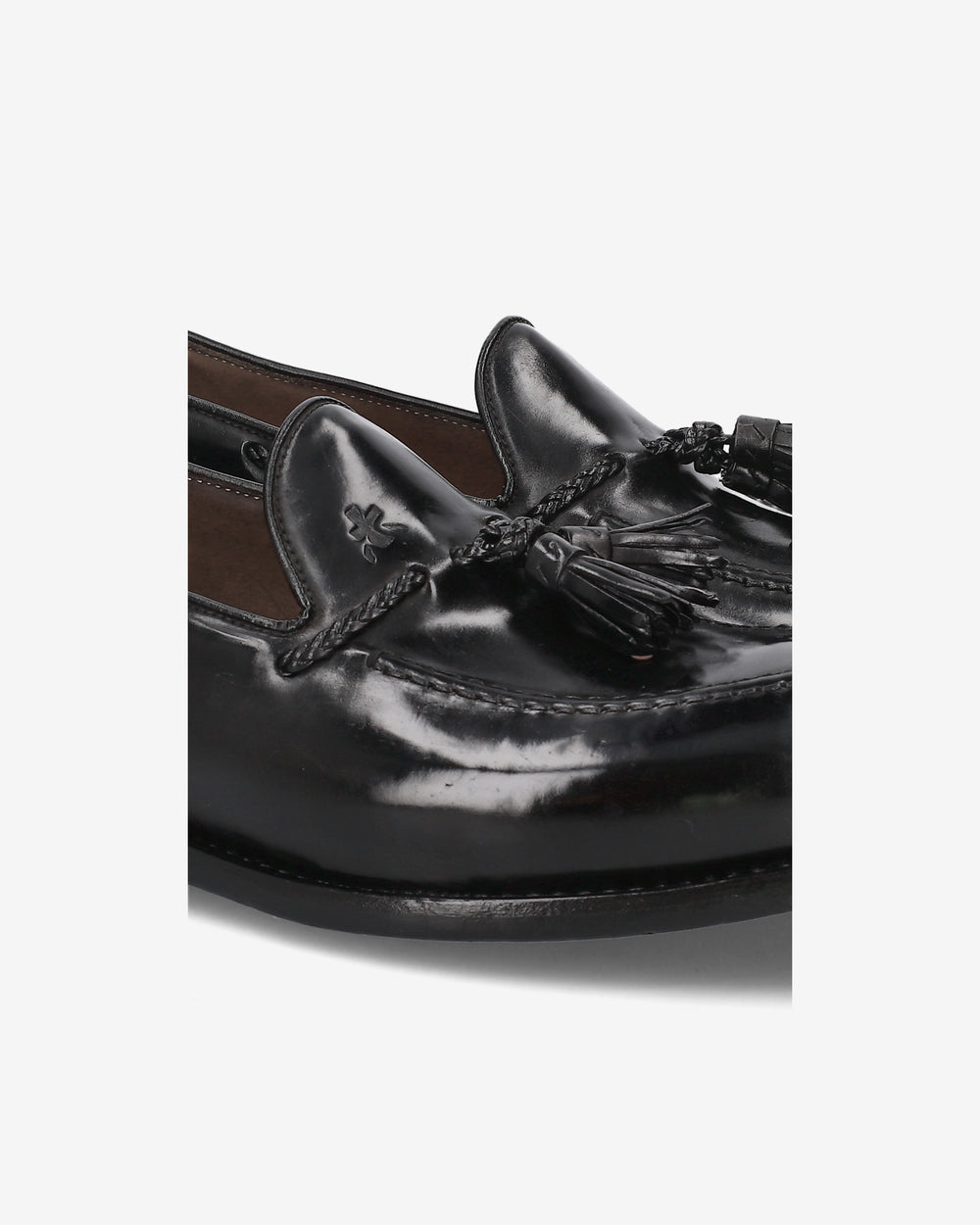 Mocassini con nappine in cordovan nero